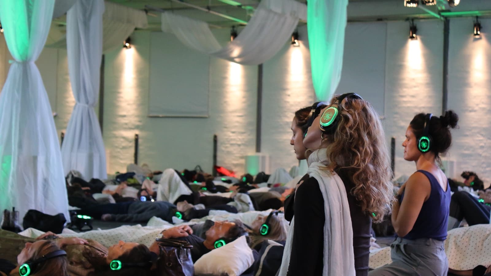 Copenhagen Health Week participants taking part in a guided mind-body session at Øksnehallen
