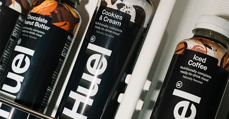 Bottles of Huel ready-to-drink complete nutrition in a refrigerated display